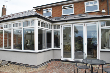 Ivory Woodgrain PVCu Bi-folding Doors, 
