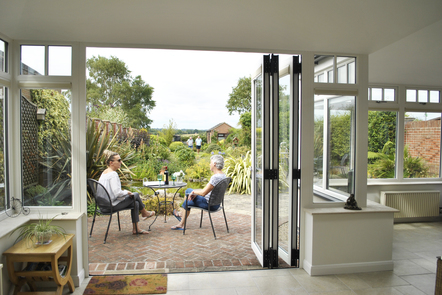 Ivory Woodgrain PVCu Bi-folding Doors, 