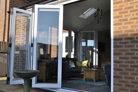 White PVCu Bi-folding doors, 