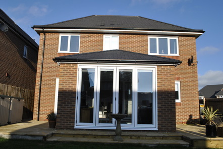 White PVCu Bi-folding doors, 