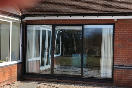 Brown Aluminium Triple Track Patio Door, 